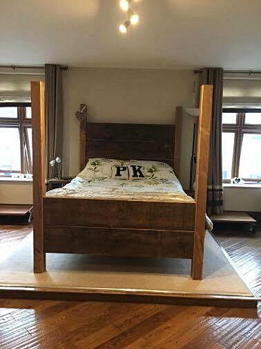 Winchester Rustic Solid-Wood Four Post Bed.